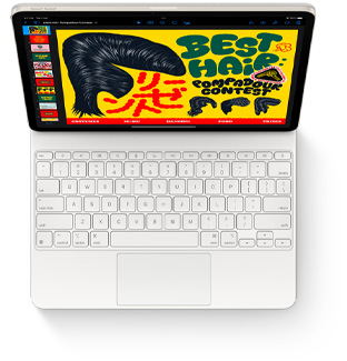 Top down view of iPad Air with Magic Keyboard for iPad Air in white.
