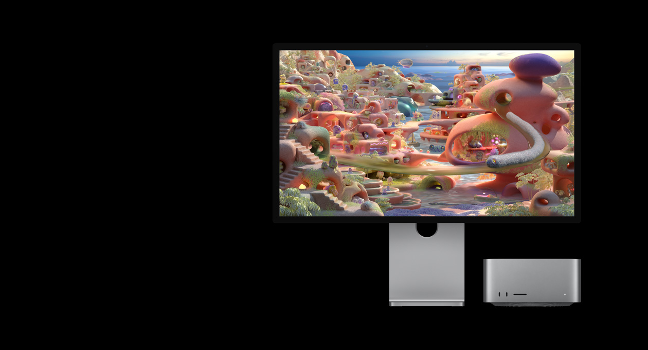 Dalam lanskap kartun di Studio Display XDR dengan Mac Studio yang terselip di bawahnya, makhluk menyerupai cacing muncul dari terowongan dan bergerak di layar