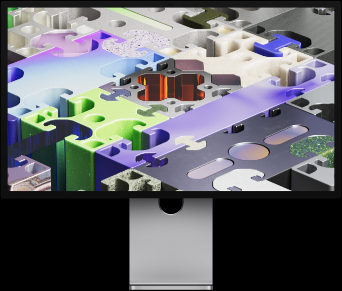 Bagian depan Studio Display XDR dengan wallpaper seperti puzzle tiga dimensi