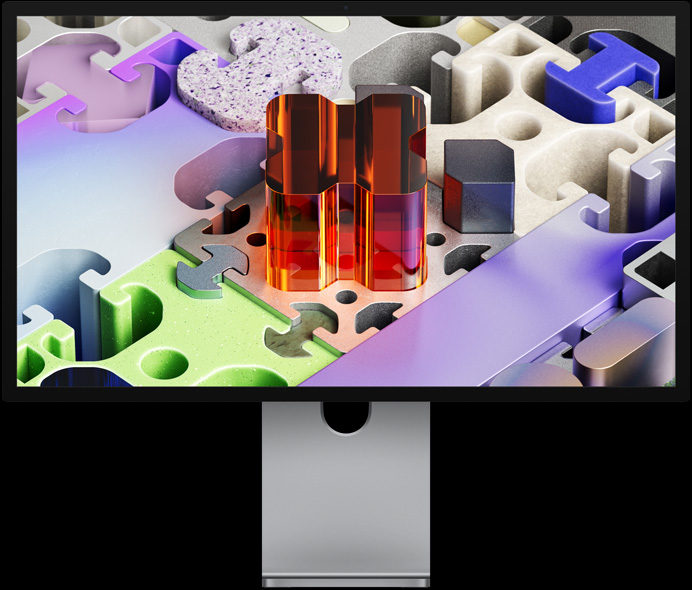 Bagian depan Studio Display XDR dengan wallpaper seperti puzzle tiga dimensi